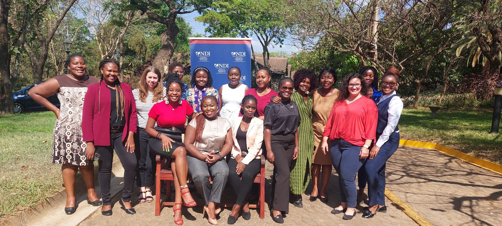 A group of trainers and participants gather outside after the digital security training in Lilongwe, Malawi, in October 2023