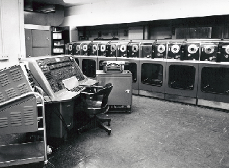 Black and white image of control center with control panels