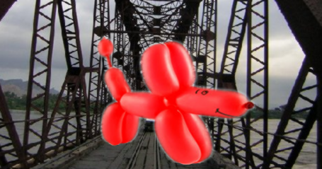 Balloon animal, dog, on a bridge.