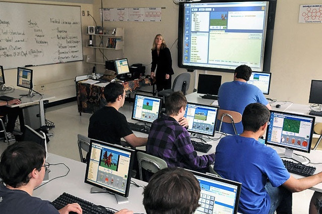 People designing video games in a classroom