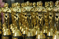 Academy Awards "Oscar" trophies. A gold, statuesque man.