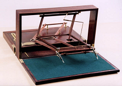 One of the first polygraphs, made of wood.