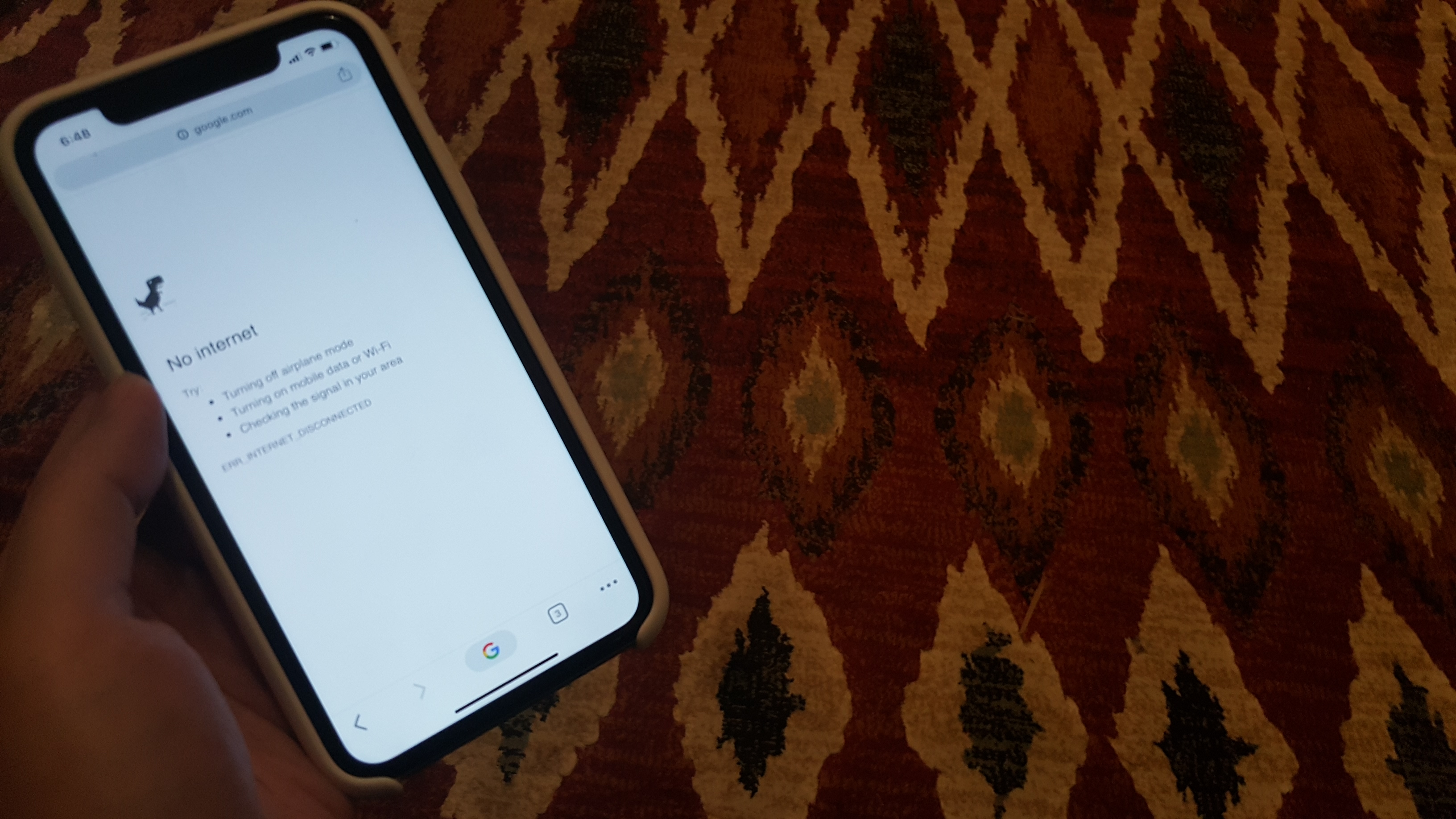 A phone shows Google's "No internet" error screen, indicating an internet shutdown.